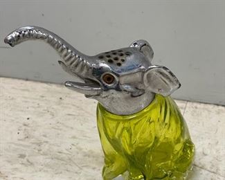 Vintage green glass elephant sugar shaker with pewter head. Photo 1 of 2.