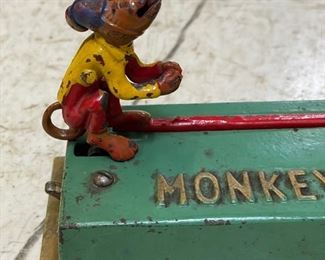 Antique cast iron monkey bank. Photo 2 of 3.