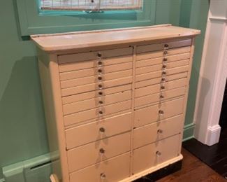 Vintage Dental Cabinet / Chest. Measures approximately 36” W x 18” D x 38” H.