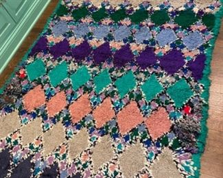 Handwoven Rug. Measures 11’ 4” x 4’ 8.”