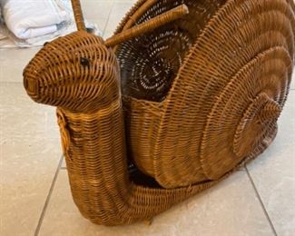 Rattan Snail Magazine Holder.