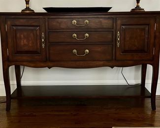 Console. Measures 61" W x 20" D x 38" H.