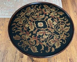 Decorative wood side table. Measures 20" H x 25" D. Photo 1 of 2.