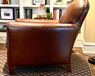 Crate & Barrel leather chair & ottoman. Chair measures 30" W x 36" D. Ottoman is 25" x 20." Photo 2 of 5.