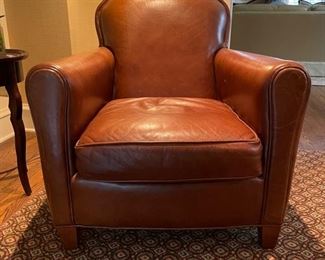 Crate & Barrel leather chair & ottoman. Chair measures 30" W x 36" D. Ottoman is 25" x 20." Photo 1 of 5.