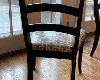 Set of 6 ebony modern ladder back chairs with vinyl covered lattice upholstered seats. Photo 2 of 3.