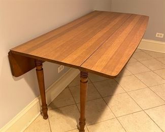 Drop leaf table / console. Measures 60" W x 20" - 40" D with two 9" drop leaves. Photo 1 of 2.