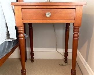 Antique side table with glass pull. Measures 21" W x 18" D x 29" H. Photo 1 of 2.