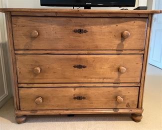 Antique pine three-drawer chest of drawers. Measures 42" W x 20 D x 32" H. Photo 1 of 4.
