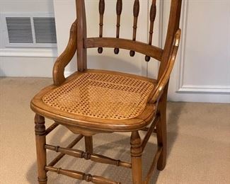 Antique cane-seat chair. Photo 1 of 3.