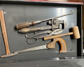 Saw, Mallet, Hammer, Assorted Tools.