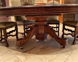 Antique French extension dining table. Measures 81" W x 64" x 28.5" H with 25" clearance. Comes with 46" W leaf and pads. Photo 3 of 5.
