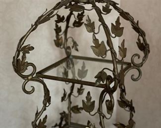 Metal and glass etagere. Measures 52" H x 18" x 18". Photo 2 of 2.