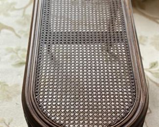 Gustavian-style cane-top cocktail table. Measures 36" W x 15" D x 18.5" H. Photo 1 of 3.