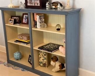 K. A. Roos blue bookcase. Measures 56.5" W x 13.5" D x 42" H. Photo 2 of 2.