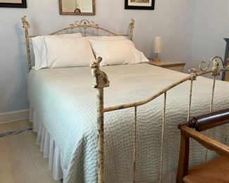 Queen size white-washed metal bed frame with bunny adornments. Photo 1 of 5.