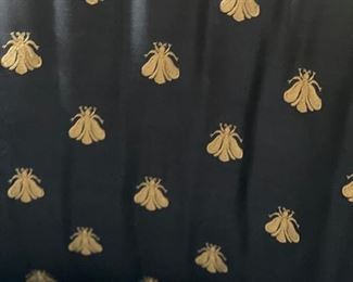 Pair of barrel back chairs upholstered in Bee fabric. Each measures 31.5" D. Photo 4 of 4.