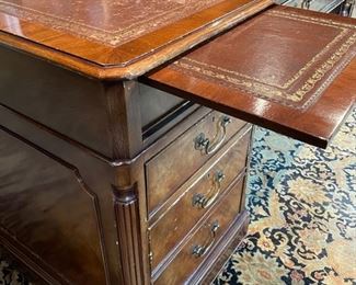 Flame Mahogany leather top desk with pull out tray. Measures 71" W x 36" D. Photo 3 of 4.