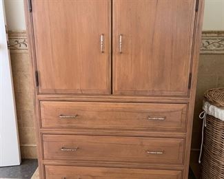 Armoire. Measures 37" W x 20" D x 54" H.