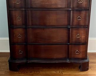Mahogany serpentine front four-drawer chest of drawers. Measures 33" W x 19" D x 34" H. Photo 1 of 3.