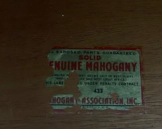 Mahogany serpentine front four-drawer chest of drawers. Measures 33" W x 19" D x 34" H. Photo 2 of 3