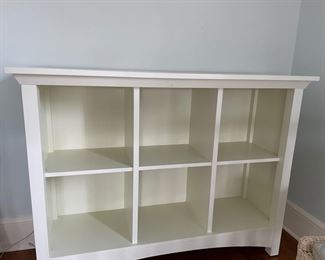 Pottery Barn white bookcase - 2 available. Each measures 51" W x 16" D x 39" H.