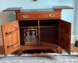Virginia Galleries cherry flip-top server / bar cabinet. Measures 50" W x 19" D x 34.5" H. Photo 1 of 4.