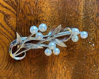 Sterling Silver Cultured Pearl Pin in a Leaf Design.