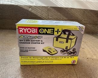 Ryobi One Battery Charger Kit.