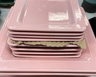 Set of pink serving plates.