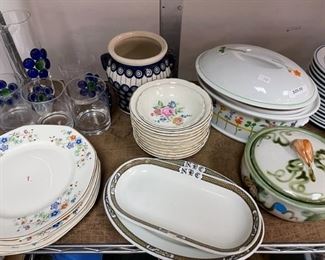 Assorted sets of dishes.