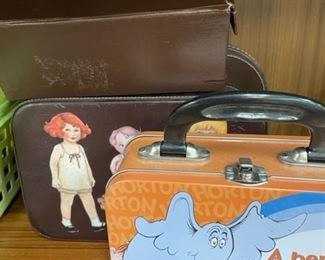 Doll suitcases and lunch box.