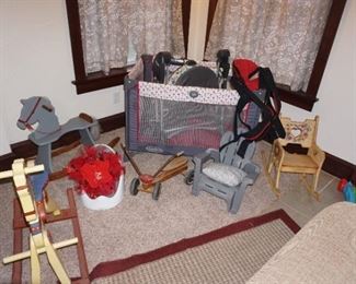 kids corner--play pen, small chairs, rocking horses, baby gear
