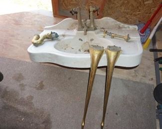 vintage sink with brass legs