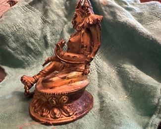 Metal statue with encrusted turquoise 3.5 inches high