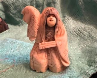 Ivory netsuke 2 inches high'