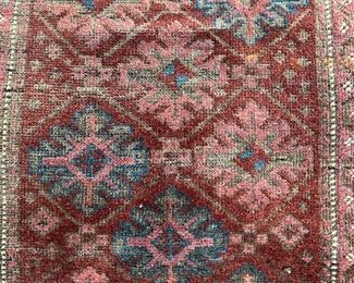 I believe this is a Balouch, pretty worn yet lovely. 37" x 20".