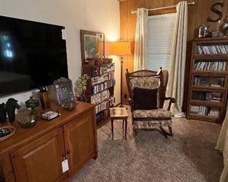 Smart TV, Entertainment Center, Vintage Cane & Wicker Rocker, Musical Inlaid Jewelry Box Side Table, Lawyers Bookshelf, Hundreds kid Books on Disc, Floor Lamp