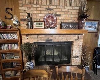 Hand crafted leather Clock by Bob Morgan, wicker/cane treasure box, Blue &White Vase with Peacock  Feathers 





