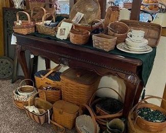 Tons of Longaburger  baskets as well as many more throughout the house and 3 place settings of pottery through the housefffftt