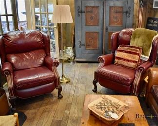 Pair of leather recliners with nailhead trim