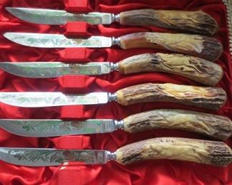 Carved bone handle knife set