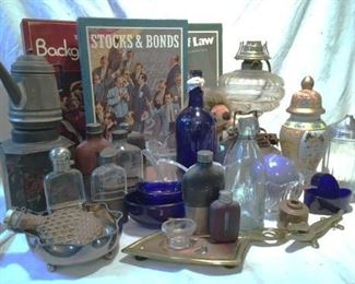 Antique flask collection, antique tinware, bottles and old games.