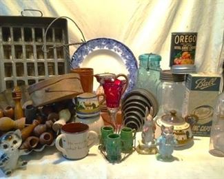 English pottery, old canning and mason jars, tin and wooden ware with a few Beatrix Potter figurines.