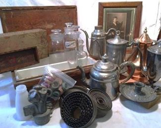 Pharmacy and drug store bottles among the silverplate, copper, tin ware