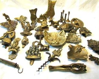 Very small sampling of the variety of old brass items....nut cracker, corkscrew, doorknocker, candlestick holders, figurines, bells, dished and more