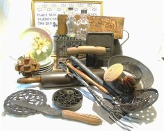 Lots and lots of old kitchen ware utensils, pots, pans and unusual pieces