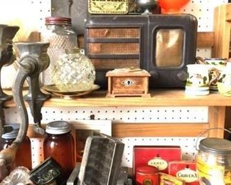 Old radio, small advertising tins and glass jars