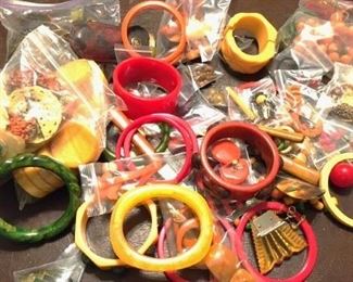 A small sampling of some of the bakelite jewelry available, also flatware, utensils, figurines, buttons, game pieces and more