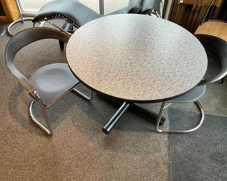 Laminate Top and Metal  Base Round Table with 2 Leather and Chrome Barrel Chairs